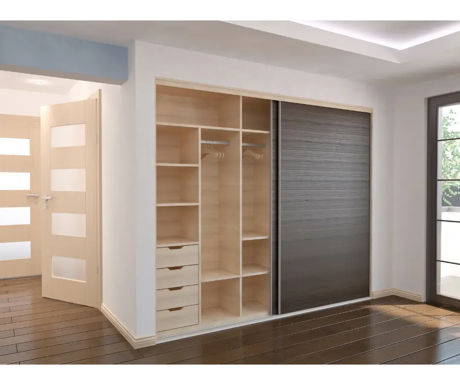 Montage d'une armoire ou pendrie à portes coulissantes